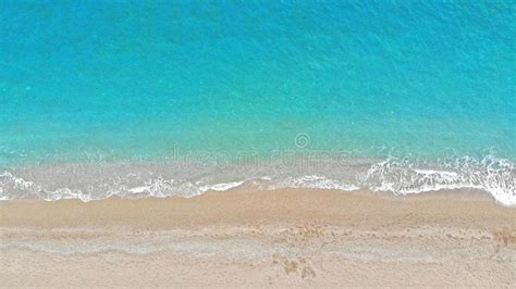 Aerial Sea Water Waves And Beach Texture Background Top View Stock