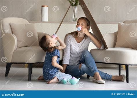 Caring Mom And Little Daughter Play At Home Stock Image Image Of Girl People 213377151