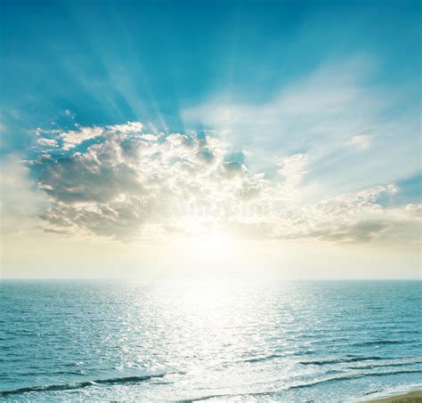 Rising Sun On The Horizon Over Blue Sea Stock Image Image Of Coast