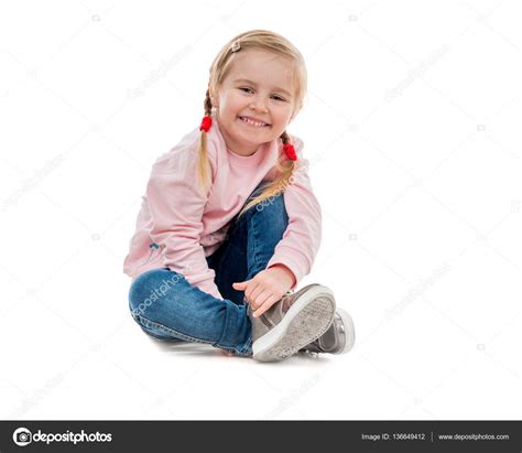 Lovely Little Girl Sitting On The Floor Stock Photo By ©tan4ikk 136649412