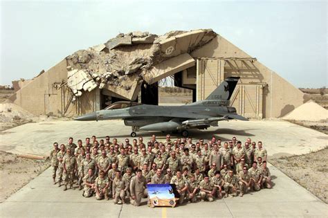 Deployed Members Of The 185th Fighter Wing Pose With Their F 16c