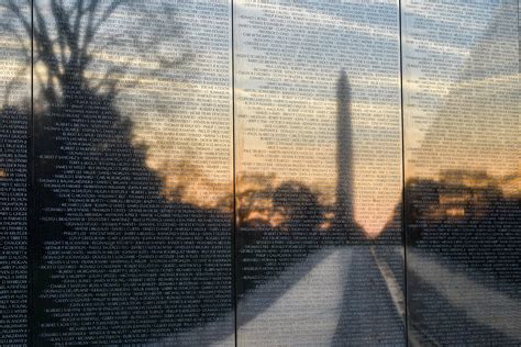 Wall Of Faces Photo Found For Each Service Member With Name Inscribed On The Vietnam Veterans