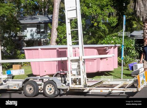 Fibreglass Swimming Pool Being Delivered To A Home In Sydney Being Held