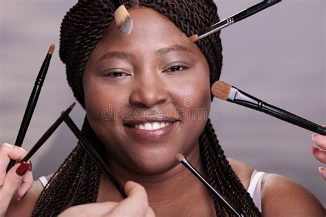 Makeup Artist Hands Applying Decorative Cosmetics On Woman Face Stock