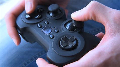 Young Man Holding Game Controller Playing Video Games Stock Footage