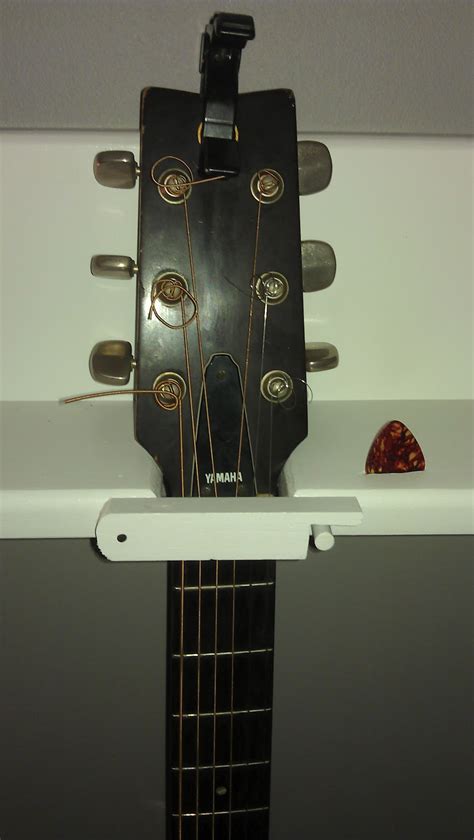 Idea for hanging guitar uke. DIY: 4-Guitar Wall Hanger. Cost: $15ish. FEATURED AS AN EDITOR'S CHOICE AT INSTRUCTABLES.COM ...