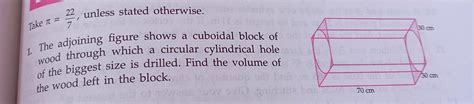 The Adjoining Figure Shows A Cuboidal Block Of Wood Through Which A