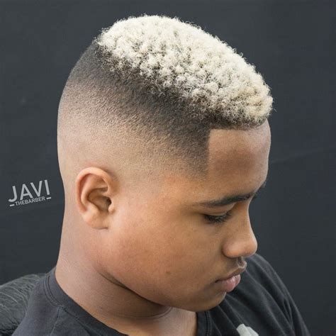 Shaved lines and designs are the key elements of today's cool haircuts. Fade Haircuts For Black Men (2020 Styles)