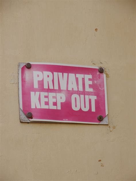 Red Sign With White Letters Which Is Saying Private Keep Out Stock
