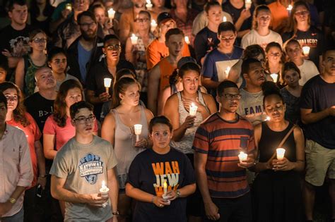 Hundreds Carry Lit Candles Across U Va Campus Against White