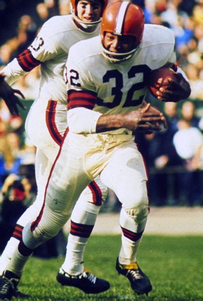 Jim Brown Of The Cleveland Browns Carries The Ball Against The New York