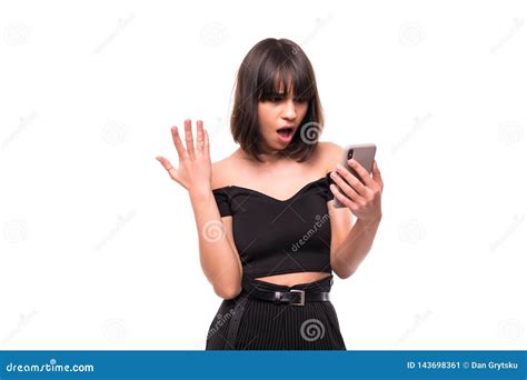 Annoyed Angry Young Woman Mad About Spam Message Stuck Phone Looking At Smartphone Isolated On