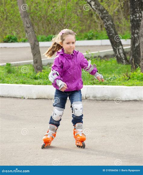 Little Girl Roller Skating Stock Photo Image Of Exercise 31056656