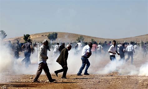 Armed Turkish Police Use Tear Gas To Disperse Kurdish Protesters Near