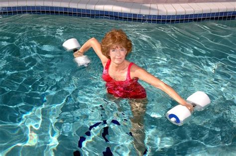 senior woman water aerobics aerobics senior fitness flexibility workout water aerobics