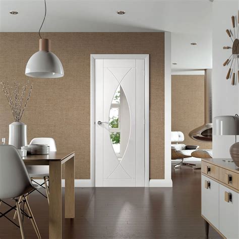 Glass cabinet doors reveal a wealth of knowledge and a sanctuary for your book collection and a style that offers effortless balance to the different elements in your living room. Pesaro White Internal Clear Glass Door | Shawfield Doors