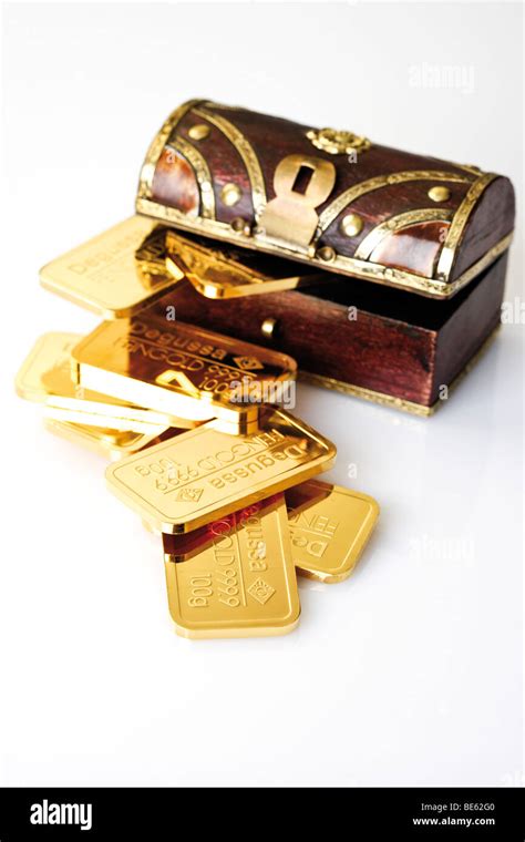 Gold Bars With A Treasure Chest Stock Photo Alamy