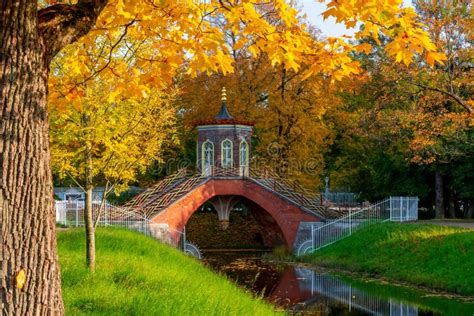 Cross Bridge In Autumn Foliage In Alexander Park Tsarskoe Selo Pushkin