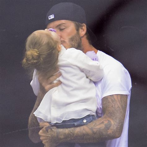 David Beckham Kisses Harper During La Kings Game Too Cute E Online