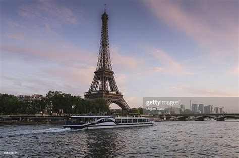 Tour Boat On River Seine Passing Near Eiffel Tower Photo Getty Images