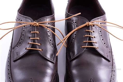 Pull the wrapped shoelace through so it comes through this hole. Ways To Lace Shoes - The Derby Shoe — Gentleman's Gazette