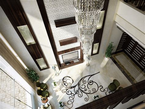 An Aerial View Of A Living Room With Chandelier And Staircase Leading