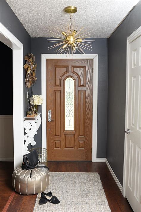 And who wouldn't love their place to feel a little more spacious, bright, and homey? How to Decorate a Small Foyer | Monica Wants It