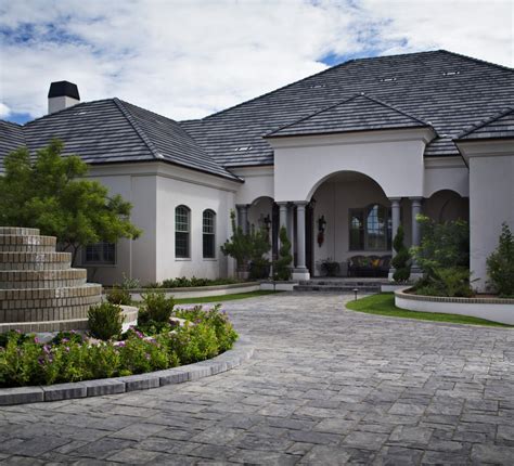 This alternative enables you to include patterns and texture in your driveway. Stamped Concrete vs. Pavers For Your Driveway or Patio ...