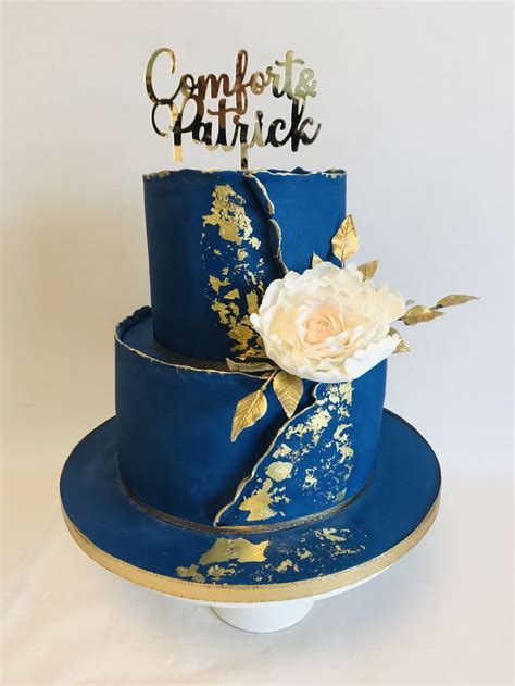 Comfort 2 Tier Royal Blue And Gold Theme Wedding Cake With Statement