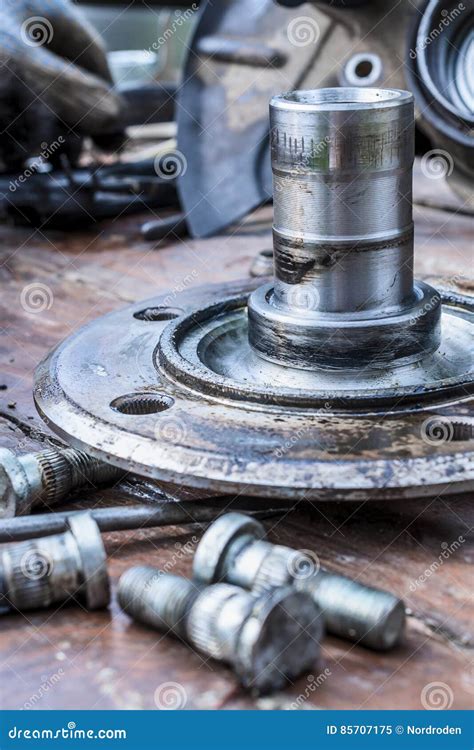Old Oiled Wheel Hub Lies On A Wooden Table Stock Image Image Of