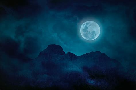 Blue Full Moon With Mountains And Forests In The Darkness Natural Scary