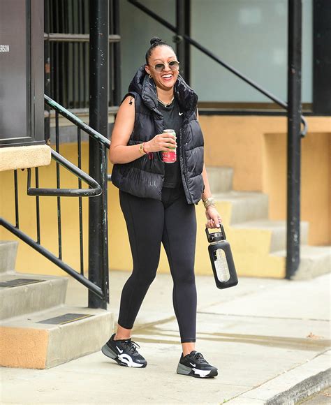Tia Mowry Serves Sporty Style In Nike Superrep Next Nature Sneakers