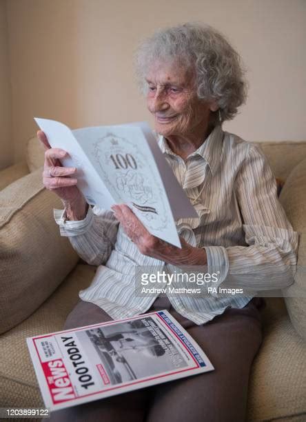 Grandmother Reading Card Photos And Premium High Res Pictures Getty