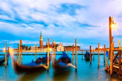 San Giorgio Maggiore Church And Gondolas In Venice Italy During Blue