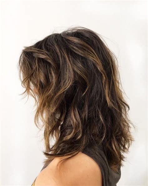 A layered brown medium length hairstyle for thick hair having a lob is a nice style that complements the hair density. 29 Best Medium Length Hairstyles for Thick Hair in 2020