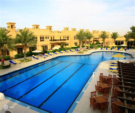 Фото отеля Al Hamra Village Town House 5 звезд аль хамра виладж таун