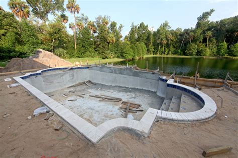 If you're building your own pool, go through your list of features, do some research, and see what works with your budget. How to Build a Concrete Block Swimming Pool | eBay