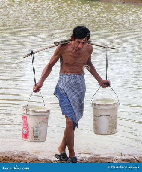 Elderly Cambodian Man Carrying Water Editorial Stock Image Image
