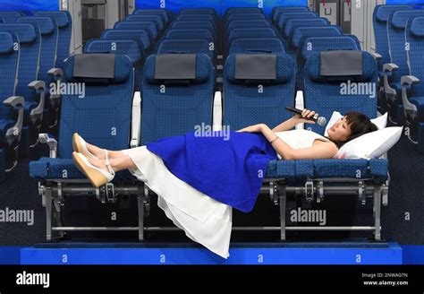 Japanese Actress Haruka Ayase Lies On A Couch Seat During A Press