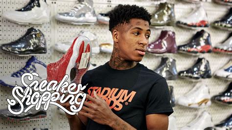 Select from premium nba youngboy of the highest quality. NBA Youngboy In Shoe Rack Background Wearing Black T-Shirt ...