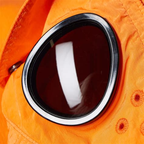 c p company undersixteen chrome hooded goggle jacket orange end us