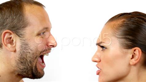 Angry Couple Yelling At Each Other Isolated On White