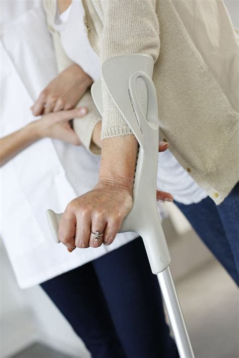 Close Up Of Old Woman S Hands On Crutch Stock Image Image Of Crutches