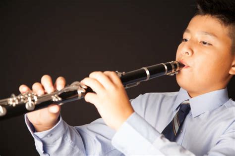 210 Boy Playing On The Clarinet Stock Photos Pictures And Royalty Free