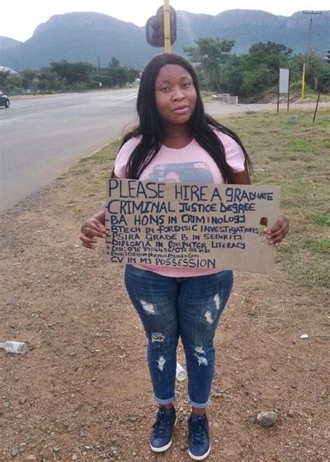 Jobless Female Graduate Begs For A Job By The Roadside With Placard Photo Jobsvacancies