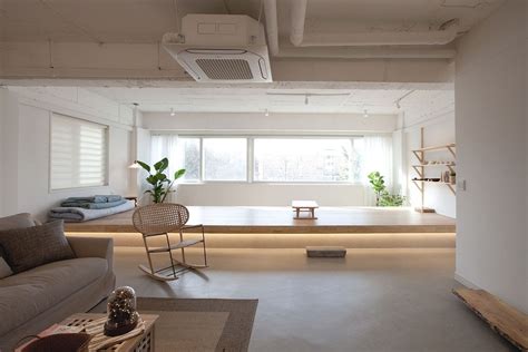 Raised Platforms Help To Make This Open Plan Apartment Feel Like It Has