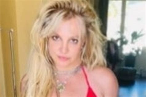 Britney Spears Strips Off To Red Bikini As She Tugs Down At Bottoms In