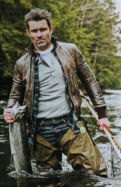 Rugged And Outdoorsman With A Brown Leather Jacket Gray Henley Plaid