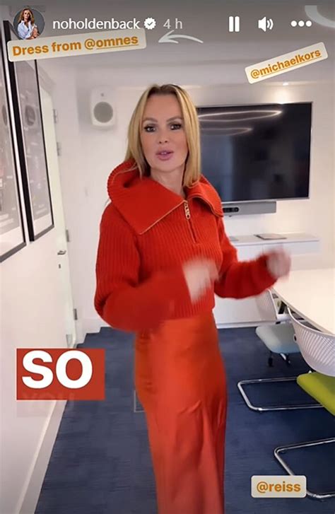 amanda holden suffers wardrobe malfunction as she flashes fans while lifting top celebrity