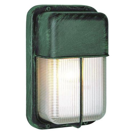 An Outdoor Wall Light That Is Green And Has Two White Lights On The